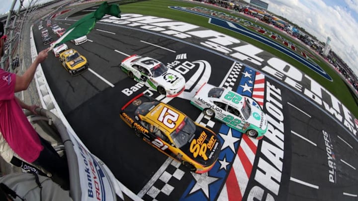 CHARLOTTE, NC - SEPTEMBER 29: Austin Cindric, driver of the #22 MoneyLion Ford, leads the field at the start of the NASCAR XFINITY Series Drive for the Cure 200 at Charlotte Motor Speedway on September 29, 2018 in Charlotte, North Carolina. (Photo by Sean Gardner/Getty Images)