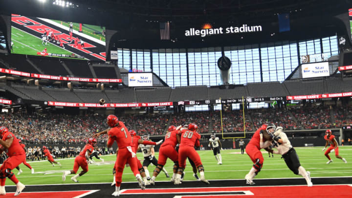 Oct 16, 2021; Paradise, Nevada, USA; UNLV Rebels quarterback Cameron Friel (7) makes a pass attempt out of his own end zone during the first half against the Utah State Aggies at Allegiant Stadium. Mandatory Credit: Stephen R. Sylvanie-USA TODAY Sports