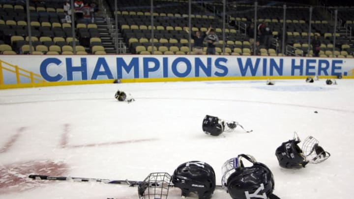 PITTSBURGH, PA - APRIL 13: Yale Bulldogs equipment lays on the ice after defeating the Quinnipiac Bobcats after the game at Consol Energy Center on April 13, 2013 in Pittsburgh, Pennsylvania. (Photo by Justin K. Aller/Getty Images)