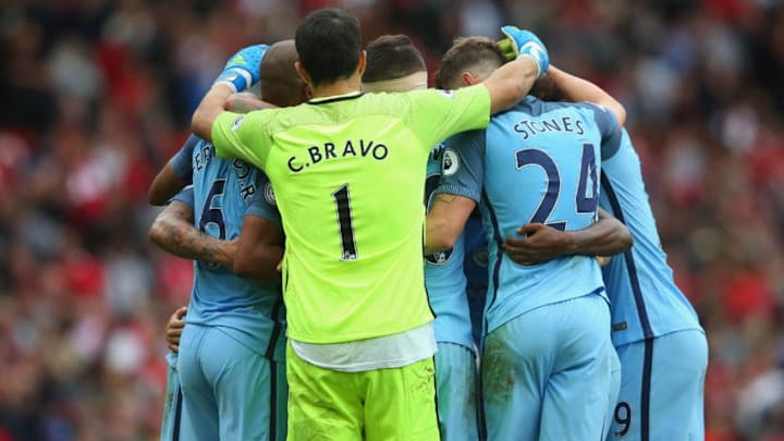 MANCHESTER, ENGLAND - SEPTEMBER 10: Manchester City players celebrate during the Premier League match between Manchester United and Manchester City at Old Trafford on September 10, 2016 in Manchester, England. (Photo by Alex Livesey/Getty Images)