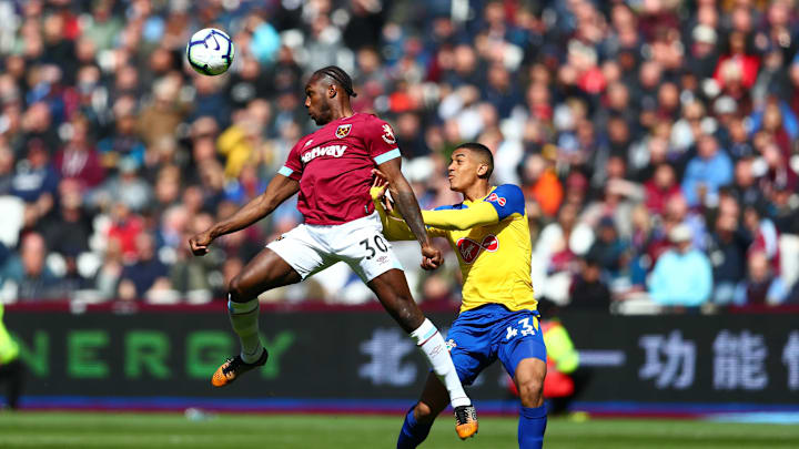 LONDON, ENGLAND – MAY 04: Michail Antonio of West Ham United is challenged by Yan Valery of Southampton during the Premier League match between West Ham United and Southampton FC at London Stadium on May 04, 2019 in London, United Kingdom. (Photo by Dan Istitene/Getty Images)