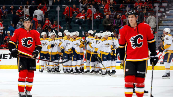 CALGARY, AB - OCTOBER 19: The Nashville Predators celebrate a 5-3 win over the Calgary Flames after an NHL game on October 19, 2018 at the Scotiabank Saddledome in Calgary, Alberta, Canada. (Photo by Gerry Thomas/NHLI via Getty Images)