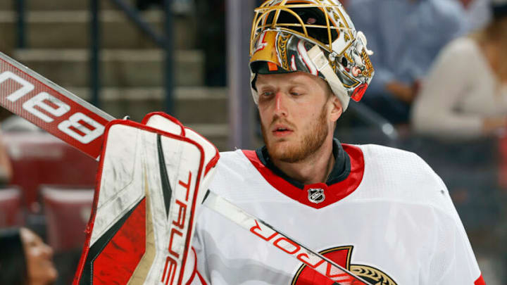 SUNRISE, FL - MARCH 3: Goaltender Anton Forsberg #31 of the Ottawa Senators checks his equipment during a break in actin against the Florida Panthers at the FLA Live Arena on March 3, 2022 in Sunrise, Florida. (Photo by Joel Auerbach/Getty Images)