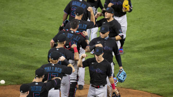 PHILADELPHIA, PA - JULY 24: The Miami Marlins celebrate their Opening Day win against the Philadelphia Phillies at Citizens Bank Park on July 24, 2020 in Philadelphia, Pennsylvania. The 2020 season had been postponed since March due to the COVID-19 pandemic. The Marlins defeated the Phillies 5-2. (Photo by Mitchell Leff/Getty Images)