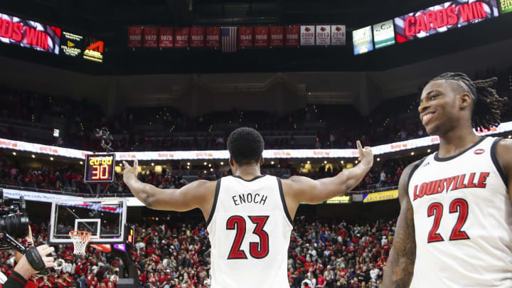 LOUISVILLE, KENTUCKY – FEBRUARY 08: Steven Enoch #23 of the Louisville Cardinals waves to the crowd after the game against the Virginia Cavaliers at KFC YUM! Center on February 08, 2020 in Louisville, Kentucky. (Photo by Silas Walker/Getty Images)
