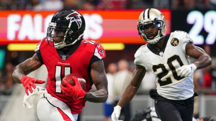ATLANTA, GA - SEPTEMBER 23: Julio Jones #11 of the Atlanta Falcons runs past Ken Crawley #20 of the New Orleans Saints after a catch during the second half at Mercedes-Benz Stadium on September 23, 2018 in Atlanta, Georgia. (Photo by Daniel Shirey/Getty Images)