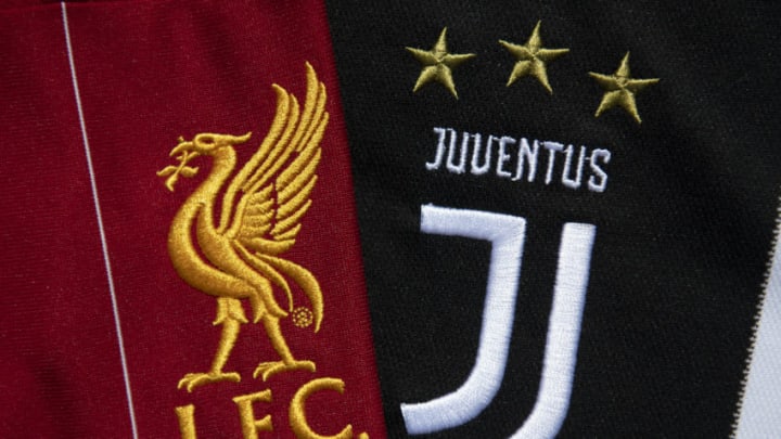 The Juventus and Liverpool club crests (Photo by Visionhaus)