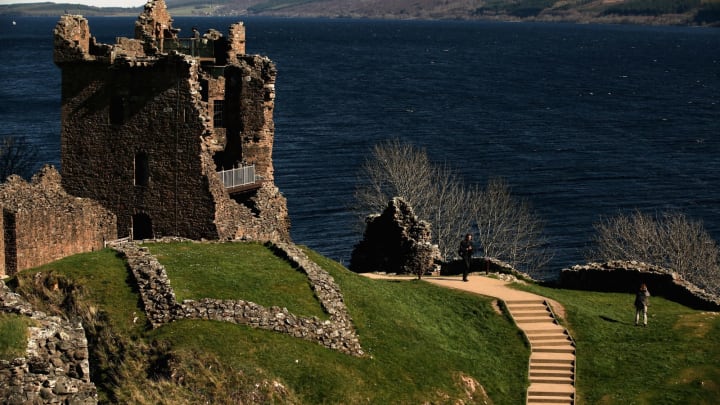 DRUMNADROCHIT, UNITED KINGDOM – MARCH 30: Tourists visit Urquhart Castle on Loch Ness on March 30, 2012 in Drumnadrochit, United Kingdom. (Photo by Jeff J Mitchell/Getty Images)