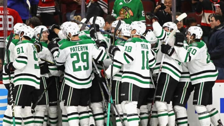 CHICAGO, IL - NOVEMBER 30: Members of the Dallas Stars celebrate a win over the Chicago Blackhawks at the United Center on November 30, 2017 in Chicago, Illinois. The Stars defeated the Blackhawks 4-3 in overtime. (Photo by Jonathan Daniel/Getty Images)