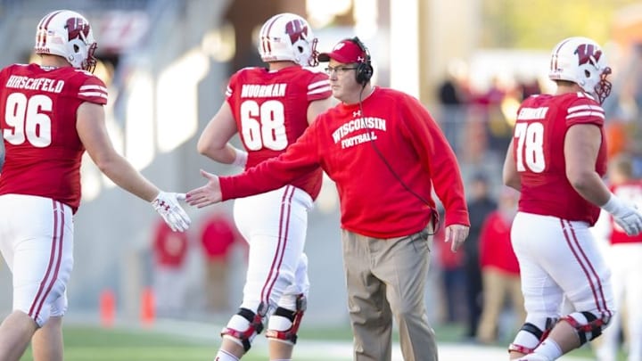 Nov 12, 2016; Madison, WI, USA; Wisconsin Badgers head coach Paul Chryst greets players following a score during the second quarter against the Illinois Fighting Illini at Camp Randall Stadium. Mandatory Credit: Jeff Hanisch-USA TODAY Sports