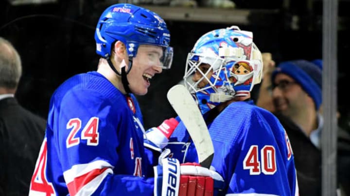 NEW YORK, NEW YORK – NOVEMBER 12: Alexandar Georgiev #40 and Kaapo Kakko #24 of the New York Rangers celebrate after Kakko scored the game winning goal in overtime for a score of 3-2 over the Pittsburgh Penguins at Madison Square Garden on November 12, 2019 in New York City. (Photo by Emilee Chinn/Getty Images)
