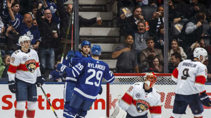 TORONTO, ON - MARCH 25: John Tavares #91 of the Toronto Maple Leafs celebrates his third goal of the night against the Florida Panthers with teammate William Nylander #29 during the second period at the Scotiabank Arena on March 25, 2019 in Toronto, Ontario, Canada. (Photo by Kevin Sousa/NHLI via Getty Images)