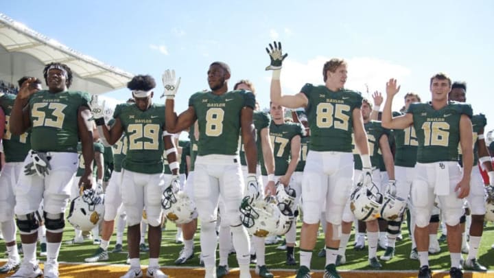 WACO, TX - NOVEMBER 3: The Baylor Bears celebrate after defeating the Oklahoma State Cowboys 35-31 in an NCAA football game at McLane Stadium on November 3, 2018 in Waco, Texas. (Photo by Cooper Neill/Getty Images)