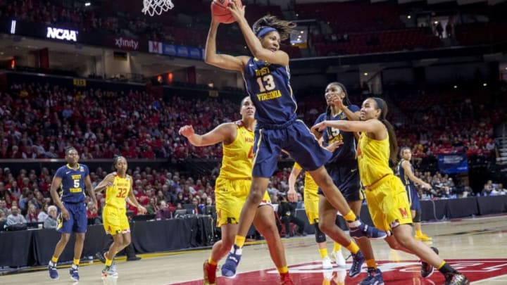 COLLEGE PARK, MD - MARCH 19: West Virginia Mountaineers forward Kristina King (13) pulls down a rebound during a Div. 1 NCAA Women's basketball 2nd. round game between Maryland and West Virginia on March 19, 2017, at Xfinity Center in College Park, Maryland. Maryland defeated West Virginia 83-56. (Photo by Tony Quinn/Icon Sportswire via Getty Images)