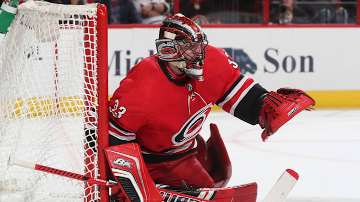 RALEIGH, NC – NOVEMBER 11: Scott Darling #33 of the Carolina Hurricanes goes down in the crease and directs traffic during an NHL game against the Chicago Blackhawks on November 11, 2017 at PNC Arena in Raleigh, North Carolina. (Photo by Gregg Forwerck/NHLI via Getty Images)