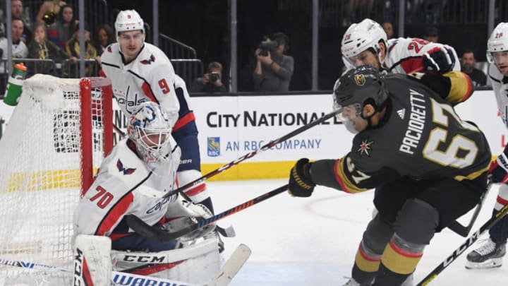 LAS VEGAS, NEVADA - FEBRUARY 17: Braden Holtby #70 of the Washington Capitals blocks a shot by Max Pacioretty #67 of the Vegas Golden Knights in the second period of their game at T-Mobile Arena on February 17, 2020 in Las Vegas, Nevada. (Photo by Ethan Miller/Getty Images)
