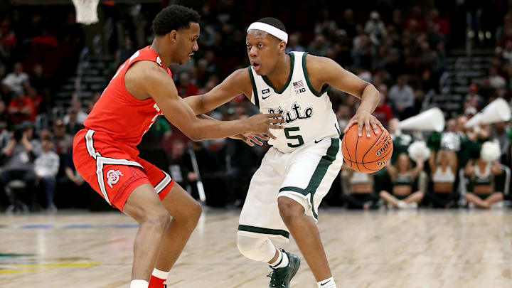 CHICAGO, ILLINOIS – MARCH 15: Cassius Winston #5 of the Michigan State Spartans dribbles the ball while being guarded by C.J. Jackson #3 of the Ohio State Buckeyes in the first half during the quarterfinals of the Big Ten Basketball Tournament at the United Center on March 15, 2019 in Chicago, Illinois. (Photo by Dylan Buell/Getty Images)