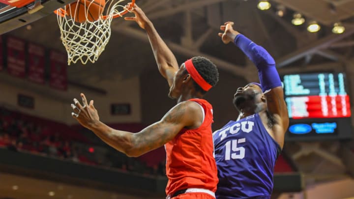 LUBBOCK, TX - JANUARY 28: Tariq Owens #11 of the Texas Tech Red Raiders dunks the basketball against JD Miller #15 of the TCU Horned Frogs during the second half of the game on January 28, 2019 at United Supermarkets Arena in Lubbock, Texas. Texas Tech defeated TCU 84-65. (Photo by John Weast/Getty Images)