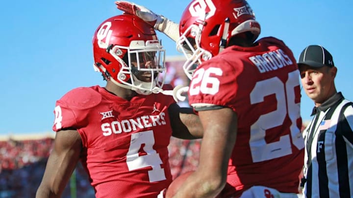 NORMAN, OK - NOVEMBER 10: Running back Trey Sermon #4 congratulates running back Kennedy Brooks #26 of the Oklahoma Sooners on a score against the Oklahoma State Cowboys at Gaylord Family Oklahoma Memorial Stadium on November 10, 2018 in Norman, Oklahoma. Oklahoma defeated Oklahoma State 48-47. (Photo by Brett Deering/Getty Images) NORMAN, OK - NOVEMBER 10: Running back Trey Sermon #4 congratulates running back Kennedy Brooks #26 of the Oklahoma Sooners on a score against the Oklahoma State Cowboys at Gaylord Family Oklahoma Memorial Stadium on November 10, 2018 in Norman, Oklahoma. Oklahoma defeated Oklahoma State 48-47. (Photo by Brett Deering/Getty Images)