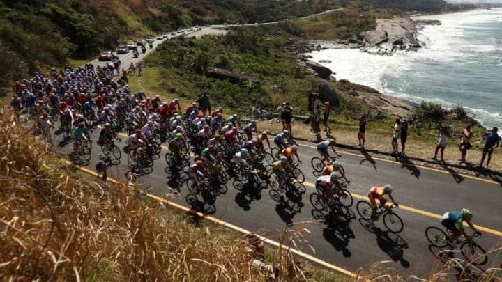 RIO DE JANEIRO, BRAZIL - AUGUST 06: Peloton roll through Grumari during the Men's Road Race on Day 1 of the Rio 2016 Olympic Games at the Fort Copacabana on August 6, 2016 in Rio de Janeiro, Brazil. (Photo by Ezra Shaw/Getty Images)