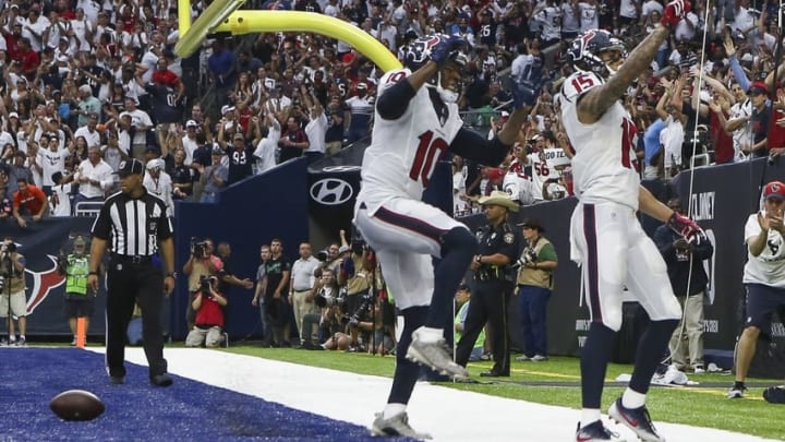 Sep 11, 2016; Houston, TX, USA; Houston Texans wide receiver Will Fuller (15) celebrates with wide receiver DeAndre Hopkins (10) after scoring a touchdown during the fourth quarter against the Chicago Bears at NRG Stadium. The Texans won 23-14. Mandatory Credit: Troy Taormina-USA TODAY Sports