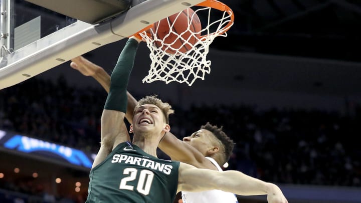 WASHINGTON, DC – MARCH 31: Matt McQuaid #20 of the Michigan State Spartans dunks the ball against the Duke Blue Devils during the first half in the East Regional game of the 2019 NCAA Men’s Basketball Tournament at Capital One Arena on March 31, 2019 in Washington, DC. (Photo by Patrick Smith/Getty Images)