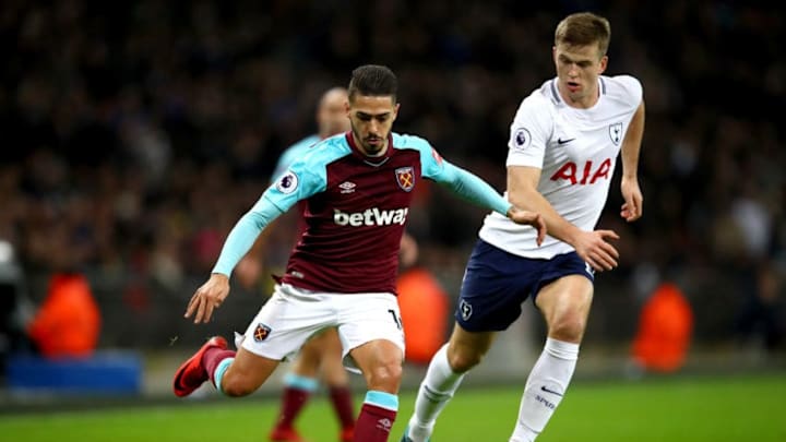 LONDON, ENGLAND - JANUARY 04: Manuel Lanzini of West Ham United runs with the ball under pressure from Eric Dier of Tottenham Hotspur during the Premier League match between Tottenham Hotspur and West Ham United at Wembley Stadium on January 4, 2018 in London, England. (Photo by Julian Finney/Getty Images)