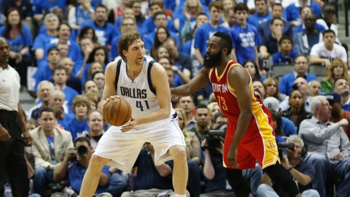 Apr 24, 2015; Dallas, TX, USA; Dallas Mavericks forward Dirk Nowitzki (41) in action in the post against Houston Rockets guard James Harden (13) in game three of the first round of the NBA Playoffs at American Airlines Center. Mandatory Credit: Matthew Emmons-USA TODAY Sports
