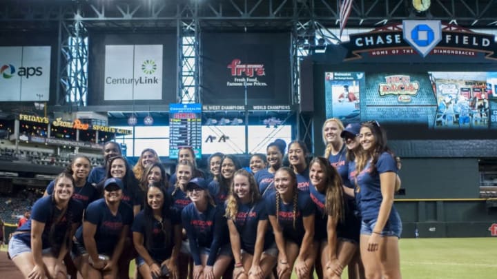 PHOENIX, AZ - SEPTEMBER 18: The University of Arizona softball team pose for a photo before the MLB game between the Los Angeles Dodgers and Arizona Diamondbacks at Chase Field on September 18, 2016 in Phoenix, Arizona. The Arizona Diamondbacks defeated the Los Angeles Dodgers 10-9 in 12 innings. (Photo by Darin Wallentine/Getty Images)