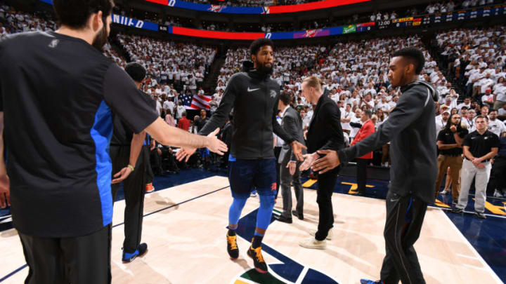SALT LAKE CITY, UT - APRIL 23: Paul George #13 of the Oklahoma City Thunder high fives his teammates before the game against the Utah Jazz in Game Four of Round One of the 2018 NBA Playoffs on April 23, 2018 at vivint.SmartHome Arena in Salt Lake City, Utah. NOTE TO USER: User expressly acknowledges and agrees that, by downloading and/or using this Photograph, user is consenting to the terms and conditions of the Getty Images License Agreement. Mandatory Copyright Notice: Copyright 2018 NBAE (Photo by Garrett Ellwood/NBAE via Getty Images)