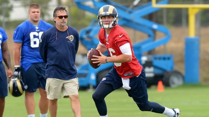 Jun 14, 2016; Oxnard, CA, USA; Los Angeles Rams head coach Jeff Fisher watches quarterback Jared Goff (16) make a pass during minicamp workouts at River Ridge Fields. Mandatory Credit: Jayne Kamin-Oncea-USA TODAY Sports