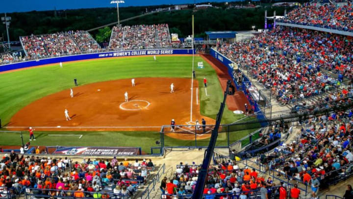 Fans watch a Women's College World Series softball game between the Oklahoma State University Cowgirls and the University of Arizona Wildcats at USA Softball Hall of Fame Stadium in Oklahoma City, Thursday, June, 2, 2022.