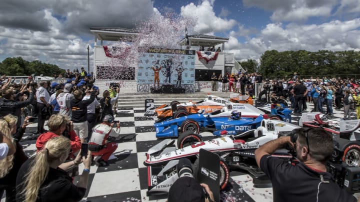 ELKHART LAKE, WI - JUNE 25: Podium finshers, L to R, Josef Newgarden, Scott Dixon, of New Zealand, and Helio Castroneves, of Brazil, celebrate in victory lane after winning the Verizon IndyCar Series Kohler Grand Prix at Road America on June 25, 2017 in Elkhart Lake, Wisconsin. (Photo by Brian Cleary/Getty Images)