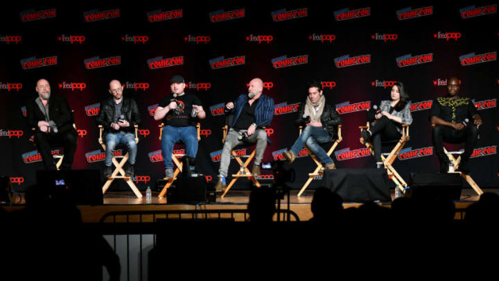 NEW YORK, NEW YORK - OCTOBER 05: (L-R) Warren Ellis, Adam Deats, Sam Deats, Graham McTavish, James Callis, Alejandra Reynoso, Adetokumboh M'Cormack speak on stage during Frederator Studios Castlevania Spotlight Panel at New York Comic Con 2019 Day 3 at Jacob K. Javits Convention Center on October 05, 2019 in New York City. (Photo by Craig Barritt/Getty Images for ReedPOP )