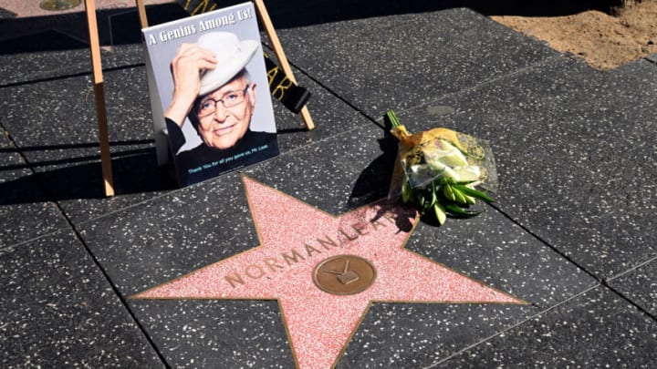 HOLLYWOOD, CALIFORNIA - DECEMBER 06: A floral arrangement is placed on the Hollywood Walk of Fame star for the late writer/producer/developer Norman Lear on December 06, 2023 in Hollywood, California. (Photo by Michael Tullberg/Getty Images)