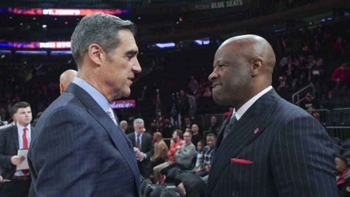 St. John's basketball head coach Mike Anderson and Villanova head coach Jay Wright (Photo by Porter Binks/Getty Images)