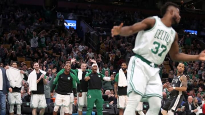 BOSTON – JANUARY 7: Boston Celtics Semi Ojeleye (37) brings his teammates out of their seats after a fourth quarter dunk. The Boston Celtics host the Brooklyn Nets in a regular season NBA basketball game at TD Garden in Boston on Jan. 7, 2019. (Photo by Jim Davis/The Boston Globe via Getty Images)