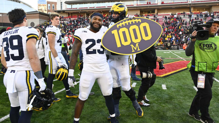 Nov 18, 2023; College Park, Maryland, USA; Michigan Wolverines linebacker Michael Barrett (23) celebrates the 1000th win in program history against the Maryland Terrapins at SECU Stadium. Mandatory Credit: Brad Mills-USA TODAY Sports