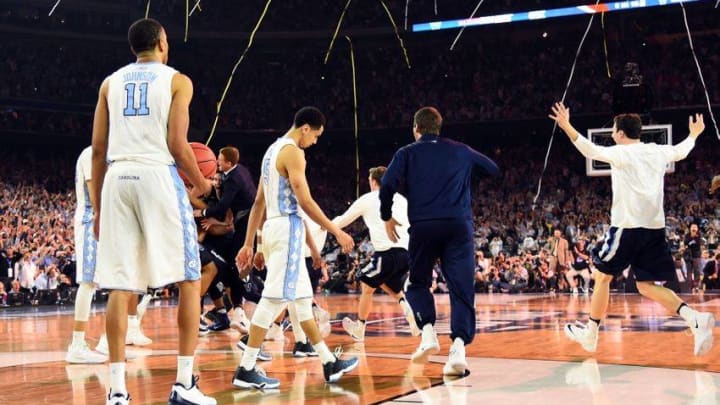 Apr 4, 2016; Houston, TX, USA; North Carolina Tar Heels forward Brice Johnson (11) and North Carolina Tar Heels guard Marcus Paige (5) react after losing to the Villanova Wildcats in the championship game of the 2016 NCAA Men