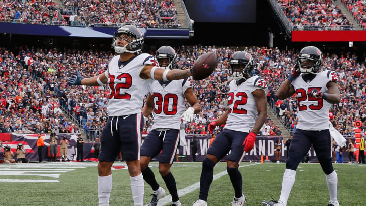 FOXBOROUGH, MA – SEPTEMBER 09: Tyrann Mathieu #32 of the Houston Texans celebrates after intercepting a pass thrown by Tom Brady #12 of the New England Patriots (not pictured) during the first quarter at Gillette Stadium on September 9, 2018 in Foxborough, Massachusetts. (Photo by Jim Rogash/Getty Images)