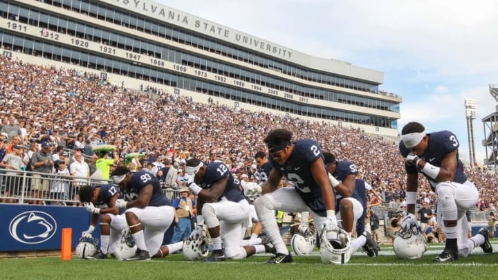 Sep 26, 2015; University Park, PA, USA; Penn State Nittany Lion players kneel in the end zone prior to the game against the San Diego State Aztecs at Beaver Stadium. Penn State defeated San Diego State 37-21. Mandatory Credit: Matthew O
