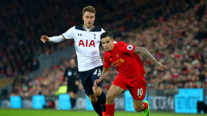 LIVERPOOL, ENGLAND - FEBRUARY 11: Philippe Coutinho of Liverpool and Christian Eriksen of Tottenham Hotspur compete for the ball during the Premier League match between Liverpool and Tottenham Hotspur at Anfield on February 11, 2017 in Liverpool, England. (Photo by Clive Brunskill/Getty Images)