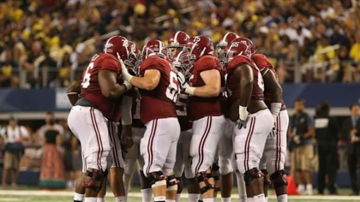 Sep 1, 2012; Arlington, TX, USA; Alabama Crimson Tide offense huddles during the game against the Michigan Wolverines at Cowboys Stadium. Alabama won 41-14. Mandatory Credit: Kevin Jairaj-USA TODAY Sports