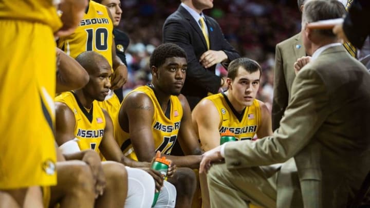 Feb 20, 2016; Fayetteville, AR, USA; Missouri Tigers guard Terrence Phillips (1) and guard Namon Wright (12) and guard Cullen vanLeer (33) listen to instructions from Tigers head coach Kim Anderson in the first half of a game with the Arkansas Razorbacks at Bud Walton Arena. The Razorbacks won 84-72. Mandatory Credit: Gunnar Rathbun-USA TODAY Sports