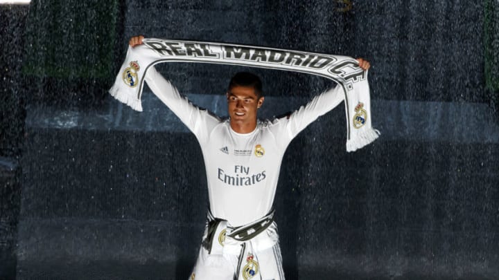 MADRID, SPAIN - MAY 29: Cristiano Ronaldo holds a scarf during Real Madrid CF team celebration at Santiago Bernabeu Stadium the day after winning the UEFA Champions League Final match against Club Atletico de Madrid on May 29, 2016 in Madrid, Spain. (Photo by Angel Martinez/Real Madrid via Getty Images)