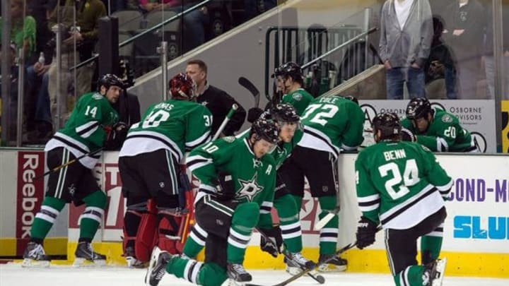 Mar 10, 2014; Dallas, TX, USA; Play is stopped during the Dallas Stars and Columbus Blue Jackets game while team officials check out center Rich Peverley (not pictured) during the first period at the American Airlines Center. Mandatory Credit: Jerome Miron-USA TODAY Sports