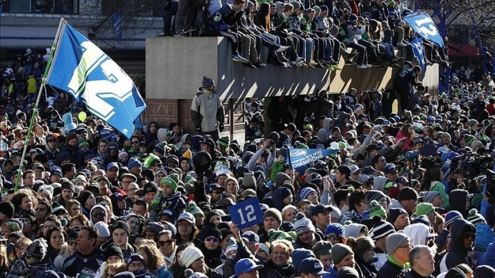 Feb 5, 2014; Seattle, WA, USA; Seattle Seahawks fans wait in Westlake Park for a Super Bowl championship parade to begin in downtown Seattle. Mandatory Credit: Joe Nicholson-USA TODAY Sports