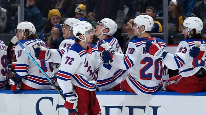 Filip Chytil #72 of the New York Rangers is congratulated by teammates