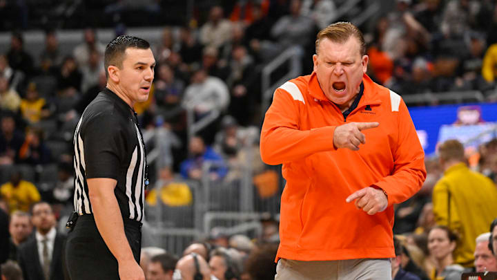 Dec 22, 2022; St. Louis, Missouri, USA; Illinois Fighting Illini head coach Brad Underwood reacts as he talks to a referee during the second half against the Missouri Tigers at Enterprise Center. Mandatory Credit: Jeff Curry-USA TODAY Sports