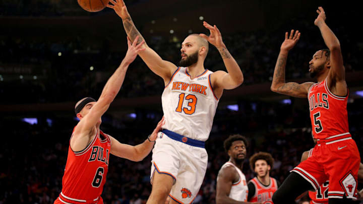 Dec 2, 2021; New York, New York, USA; New York Knicks guard Evan Fournier (13) passes the ball while covered by Chicago Bulls guard Alex Caruso (6) and forward Derrick Jones Jr. (5) during the first quarter at Madison Square Garden. Mandatory Credit: Brad Penner-USA TODAY Sports